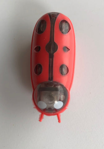 battery-operated cat toy that looks like a bug, variety of colours, 1.75" long