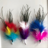 The latest addition to our handmade feather teasers. Staff and test cat favourite, it is very light and fun for your cat to bat around, pounce upon and carry around in their mouth. Variety of coloured feathers including peacock. This beautiful creation is sure to entice your cat. Play together when attached to rod or wand or leave out to appeal to your cat's natural hunting instinct to catch a "bird". Approximately 7" long to the tip of the peacock feathers, seen here in variety of colours