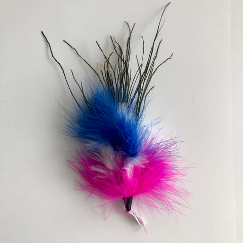 The latest addition to our handmade feather teasers. Staff and test cat favourite, it is very light and fun for your cat to bat around, pounce upon and carry around in their mouth. Variety of coloured feathers including peacock. This beautiful creation is sure to entice your cat. Play together when attached to rod or wand or leave out to appeal to your cat's natural hunting instinct to catch a "bird". Approximately 7" long to the tip of the peacock feathers