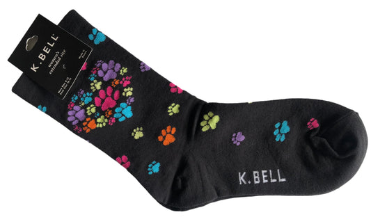 K Bell black crew socks with multicoloured pay prints all over from cuff to toe, with heart shape of paw prints at ankle, super cute, looks like flowers almost