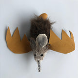 cat toy made of fur with brown leather bat wings