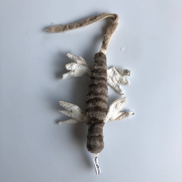 cat toy that looks like a lizard, lightweight even though 7" long tip to tail, made from sheared deer fur