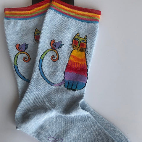 iconic Laurel Burch rainbow cat with bird perched on its tail, light blue with rainbow cuff