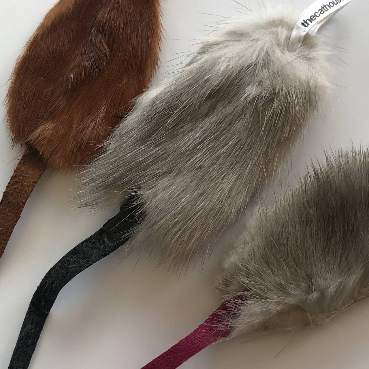 3 real fur mouse closeup so you can see the fur recycled from old fur coats, different colours and different leather tail colours too - pink tail is our favourite!