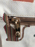 closeup of zipper and detail on exterior zip pocket