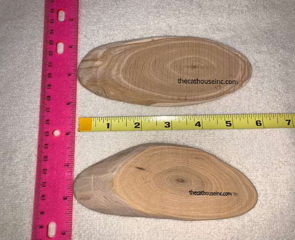 2 slices of honeysuckle wood, one is 47g one is 40g, about 1/2" thick, both about 5.5" long