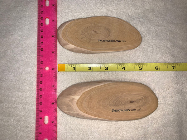 slice of honeysuckle wood, both about 6" long, 1/2" thick, shows how different mass can be between 2 slices that look the same same but one is 5 g heavier